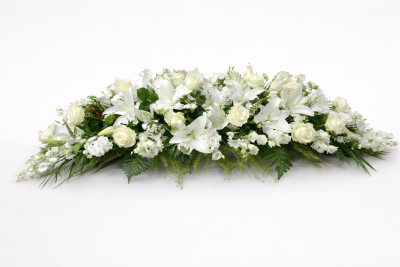 Elegant Spray - This is a beautiful and elegant natural looking spray which is designed to rest on top of a casket. It contains a variety of mixed flowers in the neutral colour scheme of creams, whites and lime green.

 

This stunning spray includes Stephanotis (when in season), Roses, Lisianthus and single flowered Chrysanthemums together with other seasonal flowers which enhance and complement the style of this elegant floral tribute.

 

The Elegant Spray has been arranged in water retaining foam (oasis) to ensure maximum freshness and is available in 3 sizes.

 

Standard size is 4ft

 

Deluxe size is 5ft

 

Luxury size will be the full length

 

 

 

We deliver directly to all of the local funeral directors and will contact them to confirm a delivery time and to ensure we make the correct size if a full sized spray is ordered.

 

Our flowers at Sarah Coxon Floral Design arrive fresh from the Dutch auctions every day so you can be rest assured we are using the best quality of flowers available.

 

At Sarah Coxon Floral Design we are delighted to present this product available for flower delivery in Mid and North Norfolk.