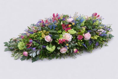 Cottage Garden Spray - This is a natural looking spray which definitely has the cottage garden look. It is designed to rest on top of a casket. It contains a variety of mixed flowers in mixed colour scheme of lime green, purple, cerise/red, pink and a touch of yellow.

 

This stunning spray includes Gloriosa, Garden-style Roses, Clematis and Hypericum together with other seasonal flowers and foliages which can be found in the garden to enhance and complement the style of this beautiful floral tribute.

 

Please note due to the nature of this spray, the flowers are all seasonal and if they are not available, we will use similar flowers which will not alter the design, colour or beauty of this spray.

 

The Cottage Garden Spray has been arranged in water retaining foam (oasis) to ensure maximum freshness and is available in 3 sizes.

 

Standard size is 3ft

 

Deluxe size is 4ft

 

Luxury size is 5ft

 

 

 

We deliver directly to all of the local funeral directors and will contact them to confirm a delivery time and to ensure we make the correct size if a full sized spray is ordered.

 

Our flowers at Sarah Coxon Floral Design arrive fresh from the Dutch auctions every day so you can be rest assured we are using the best quality of flowers available.

 

At Sarah Coxon Floral Design we are delighted to present this product available for flower delivery in Mid and North Norfolk.