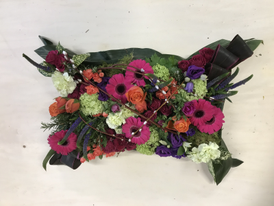 Woodland Pillow - This pillow is bright, vibrant and provides an instant burst of colour. If you are looking for something a little unique and different then this is the perfect tribute for you to send.

Standard - approx size 12"x 18"

Classic - approx size 14"x 21"

Grande - approx size 17" x 24"

We deliver directly to all of the local funeral directors and will contact them to confirm a delivery time.